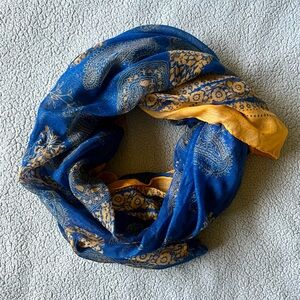 Blue and yellow chiffon scarf.